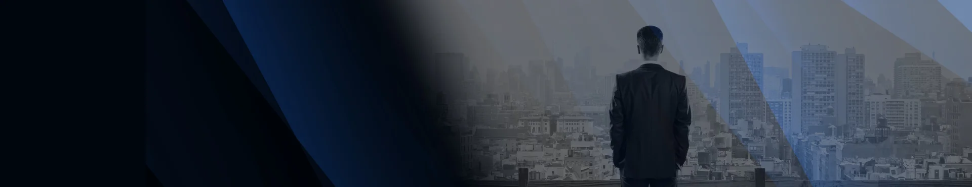 Man standing top of the building overlooking of the city. Dark background