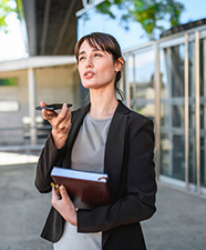 Brunette Insurance Agent speaking on a phone Image
