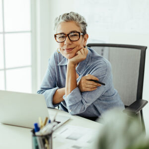 Certified Agent sitting in a chair