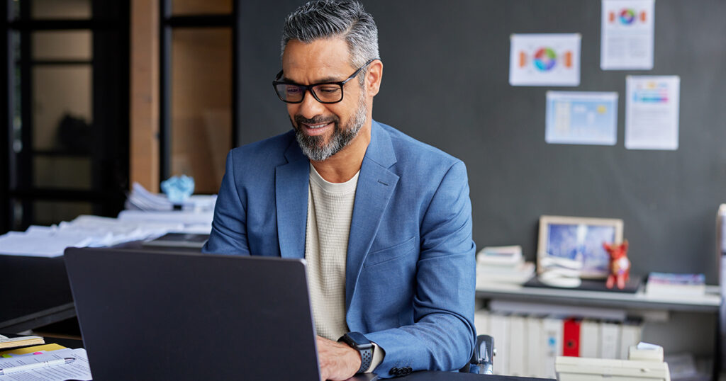 Image of a man developing his SWOT analysis for his independent insurance business